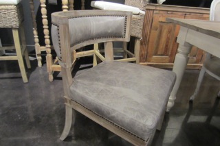 Also couldn't resist this chair, as we were leaving.  Love the gray leather against the limed wood!