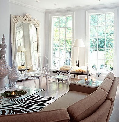 We love how the large mirror propped against the wall reflects light throughout this room.