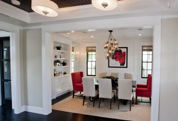 See how a crisp white makes this room appear larger, while uniting both contemporary and traditional elements throughout the room. Caviar Fixed Pendant Cluster Light $3250, Clayton Gray Home.